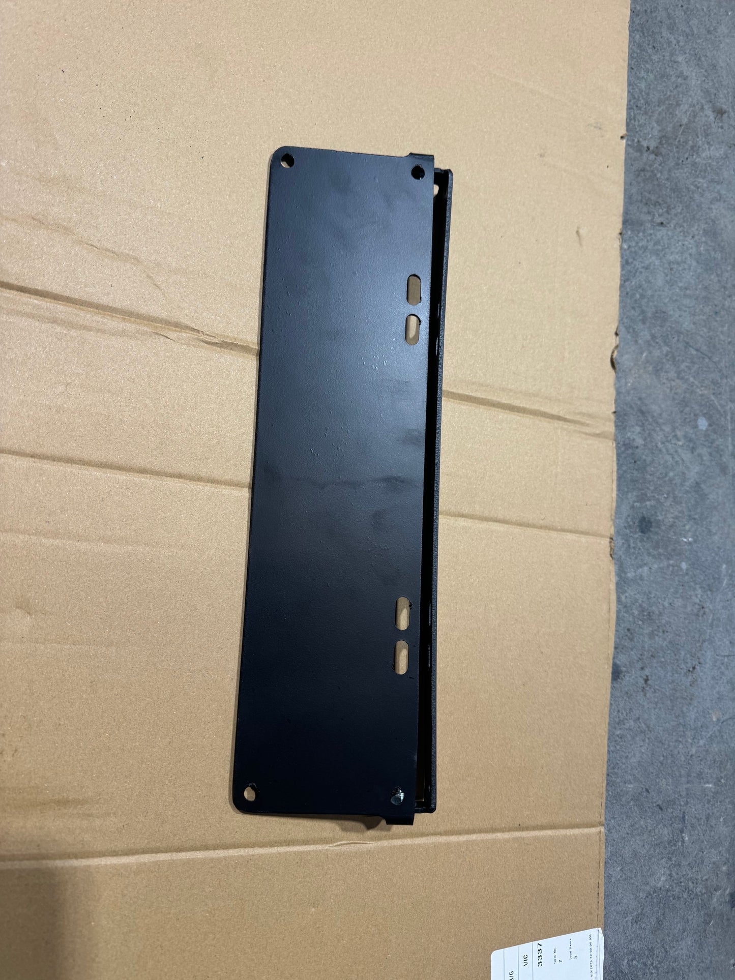 Flip up number plate bracket